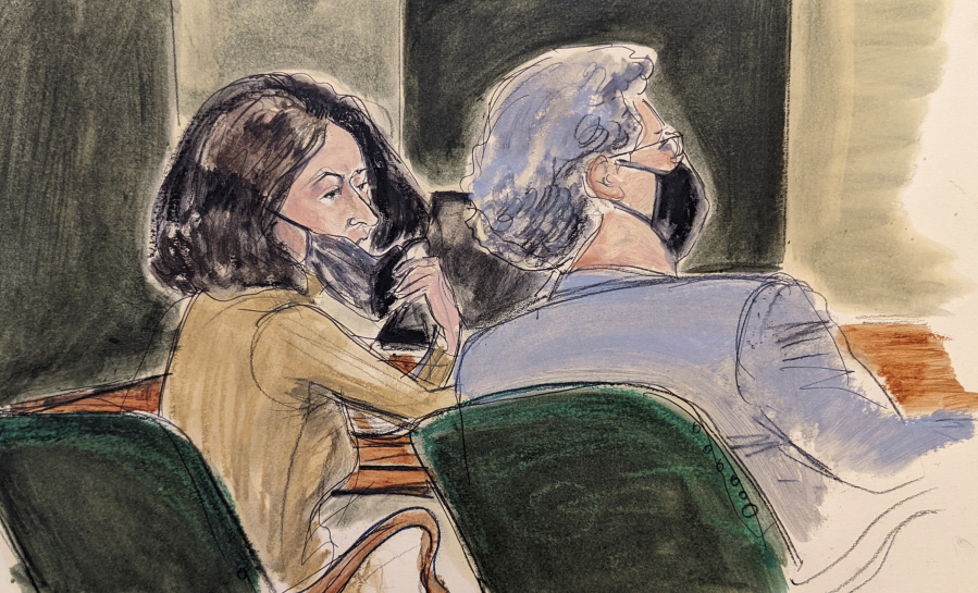In this courtroom sketch, Ghislaine Maxwell, left, pulls down her mask to talk to one of her lawyers, Jeffrey Pagliuca, during Maxwell's sex trafficking trial, Monday, Dec. 27, 2021, in New York.