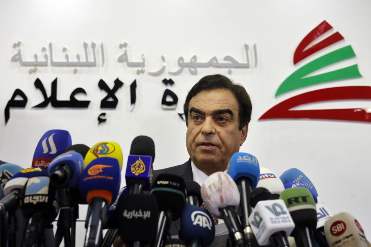 Lebanon's Information Minister George Kordahi speaks during a press conference to announce his resignation at the Ministry of Information in Beirut, Lebanon, Friday, Dec. 3, 2021. Kordahi announce his resignation Friday, in a bid to ease an unprecedented diplomatic crisis with Saudi Arabia and other Gulf countries.