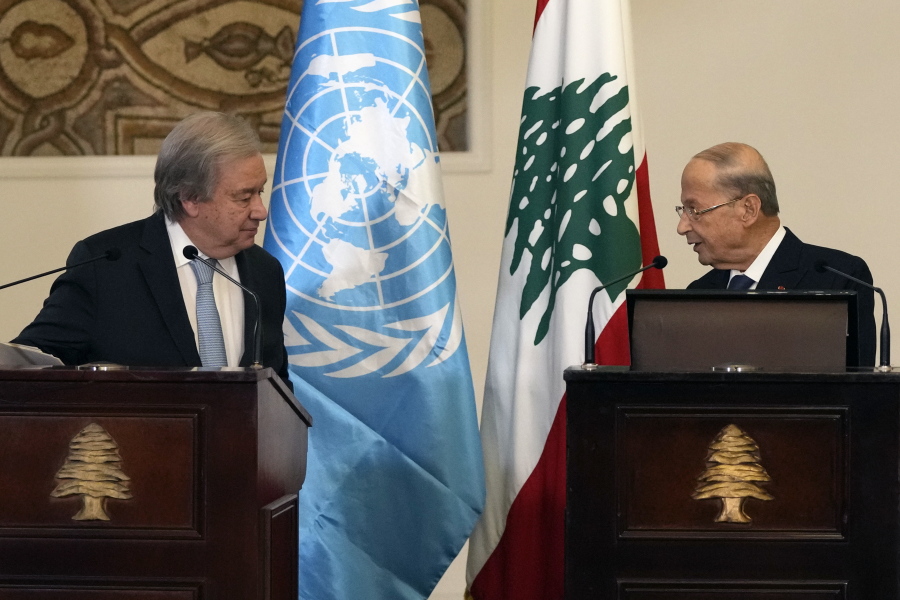 Lebanese President Michel Aoun, right, speaks during a joint press conference with United Nations Secretary-General Antonio Guterres at the presidential palace in Baabda east of Beirut, Lebanon, Sunday, Dec. 19, 2021.
