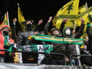 Portland Timbers supporters cheer prior to the MLS Cup soccer match against New York City FC on Saturday, Dec. 11, 2021, in Portland, Ore.