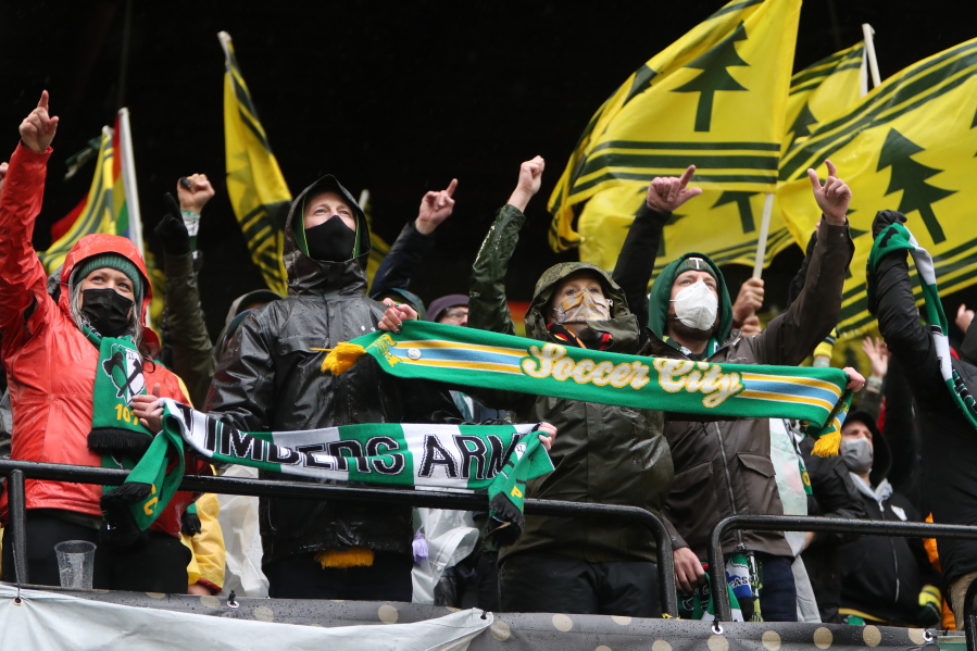 Portland Timbers supporters cheer prior to the MLS Cup soccer match against New York City FC on Saturday, Dec. 11, 2021, in Portland, Ore.