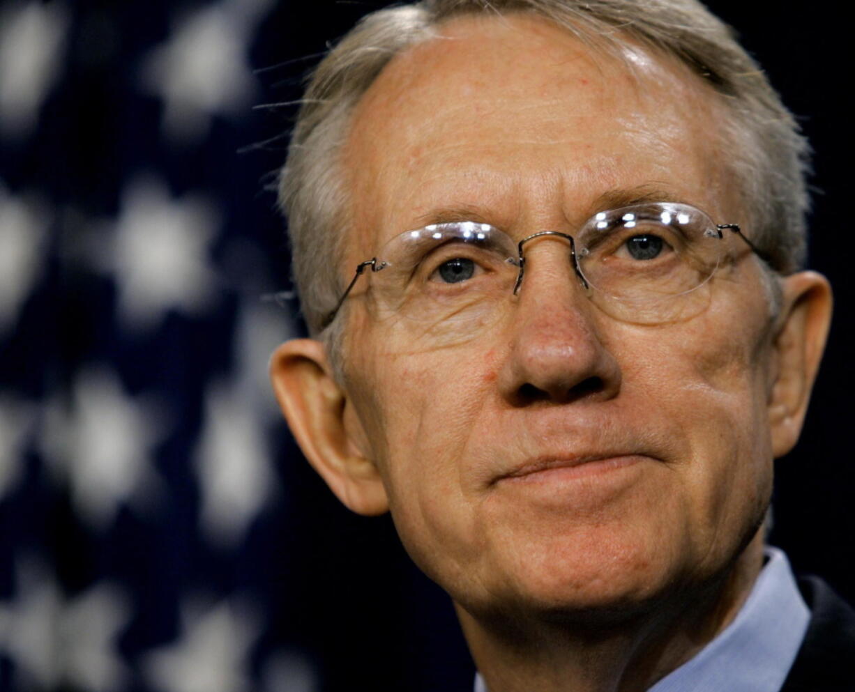 FILE -  Sen. Harry Reid, D-Nev., speaks to reporters in the Capitol after winning election by his Democratic peers as the new Senate minority leader, on Nov. 16, 2004, in Washington. Reid, the former Senate majority leader and Nevada's longest-serving member of Congress, has died. He was 82. (AP Photo/J.