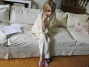 Joan Didion, photographed Sept. 27, 2007 in her New York apartment, the revered author and essayist whose provocative social commentary and detached, methodical literary voice made her a uniquely clear-eyed critic of a uniquely turbulent time, has died. She was 87.