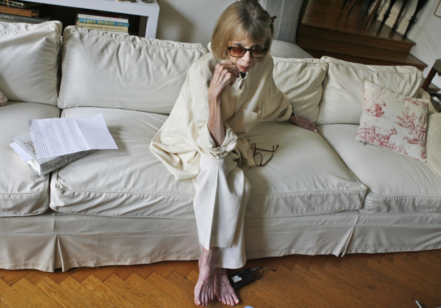 Joan Didion, photographed Sept. 27, 2007 in her New York apartment, the revered author and essayist whose provocative social commentary and detached, methodical literary voice made her a uniquely clear-eyed critic of a uniquely turbulent time, has died. She was 87.