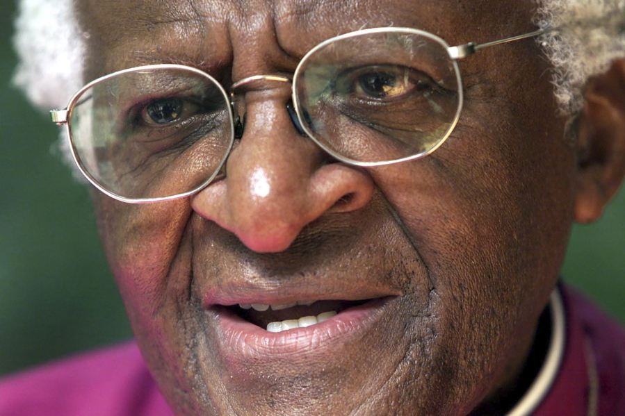 FILE - Anglican Archbishop Emeritus Desmond Tutu, speaks during an interview with the Associated Press in Pretoria, South Africa, Friday, March 21, 2003. Tutu, South Africa's Nobel Peace Prize-winning activist for racial justice and LGBT rights and retired Anglican Archbishop of Cape Town, has died at the age of 90, South African President Cyril Ramaphosa has announced.