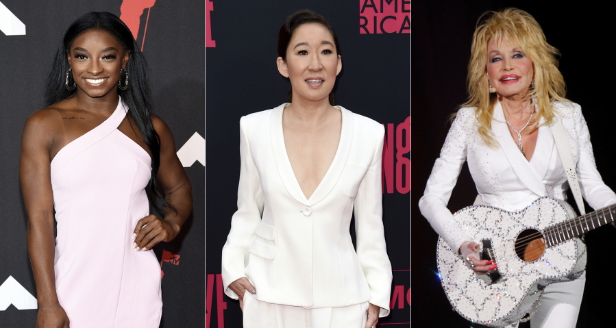 Olympic gymnast Simone Biles appears at the MTV Video Music Awards in New York on Sept. 12, 2021, left, actor Sandra Oh appears at the season two premiere of "Killing Eve" in Los Angeles on April 1, 2019, center, and Dolly Parton appears in concert in Nashville, Tenn., on July 31, 2015.