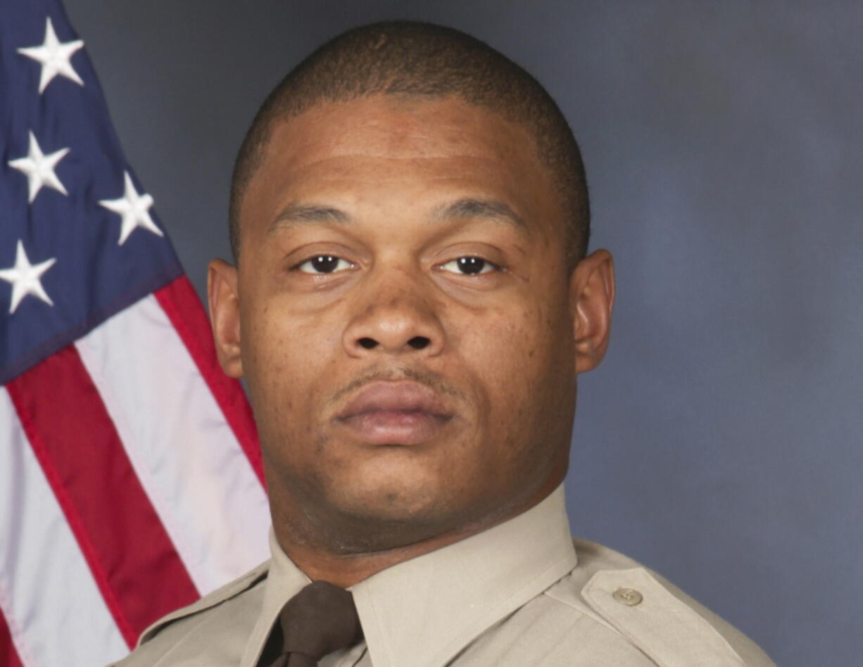 This photo provided by St. Louis County Police Department shows Detective Antonio Valentine.  The St. Louis County police detective died in the line of duty and a suspect he was trying to stop also died in a head-on collision of their vehicles.  The crash happened Wednesday, Dec. 1, 2021,  in north St. Louis County after officers with the department's drug unit tried to stop a car that had been reported stolen, police said. (St.