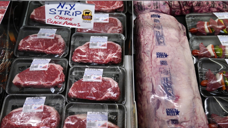 In this Tuesday, June 15, 2021 photograph, beef is displayed in the meat department at Lambert's Rainbow Market, in Westwood, Mass.