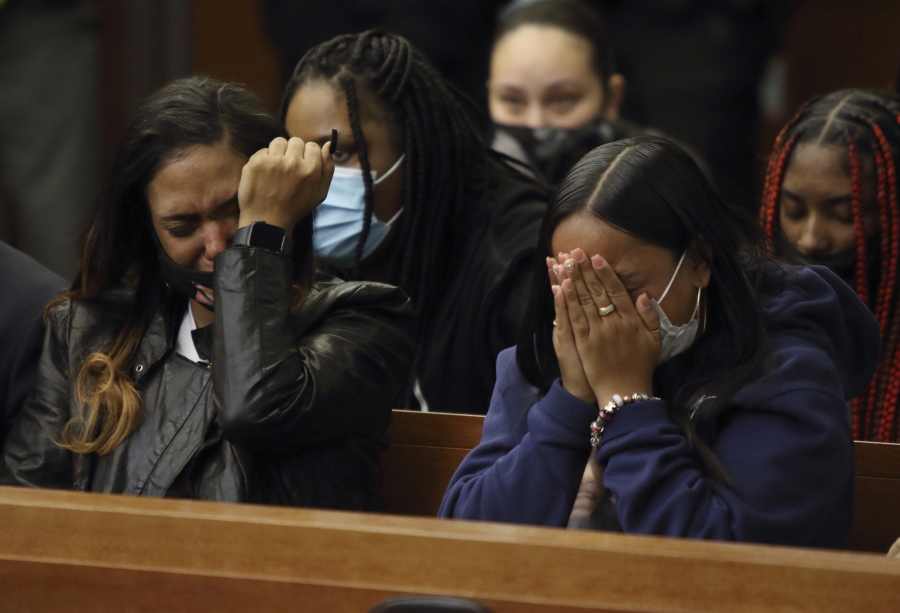 Tamala Payne, left, the mother of Casey Goodson Jr., reacts along with Goodson's aunt Brandie Payne during the reading of the statement of facts during the arraignment of former Franklin County, Ohio, deputy Jason Meade in Columbus, Ohio, Friday, Dec. 3, 2021.  Meade,  who fatally shot Casey Goodson Jr. in the back five times has pleaded not guilty to charges of murder and reckless homicide.