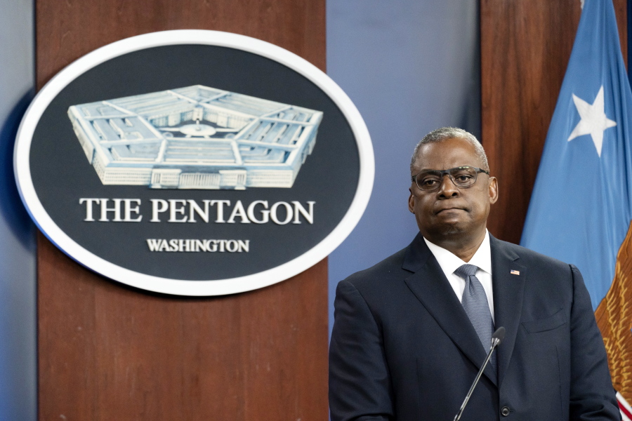 FILE - Secretary of Defense Lloyd Austin pauses while speaking during a media briefing at the Pentagon, Wednesday, Nov. 17, 2021, in Washington. In February, with the images of the violent insurrection in Washington still fresh in the minds of Americans, the newly confirmed defense secretary took the unprecedented step of signing a memo directing commanding officers across the military to institute a one-day stand-down to address extremism within the nation's armed forces.