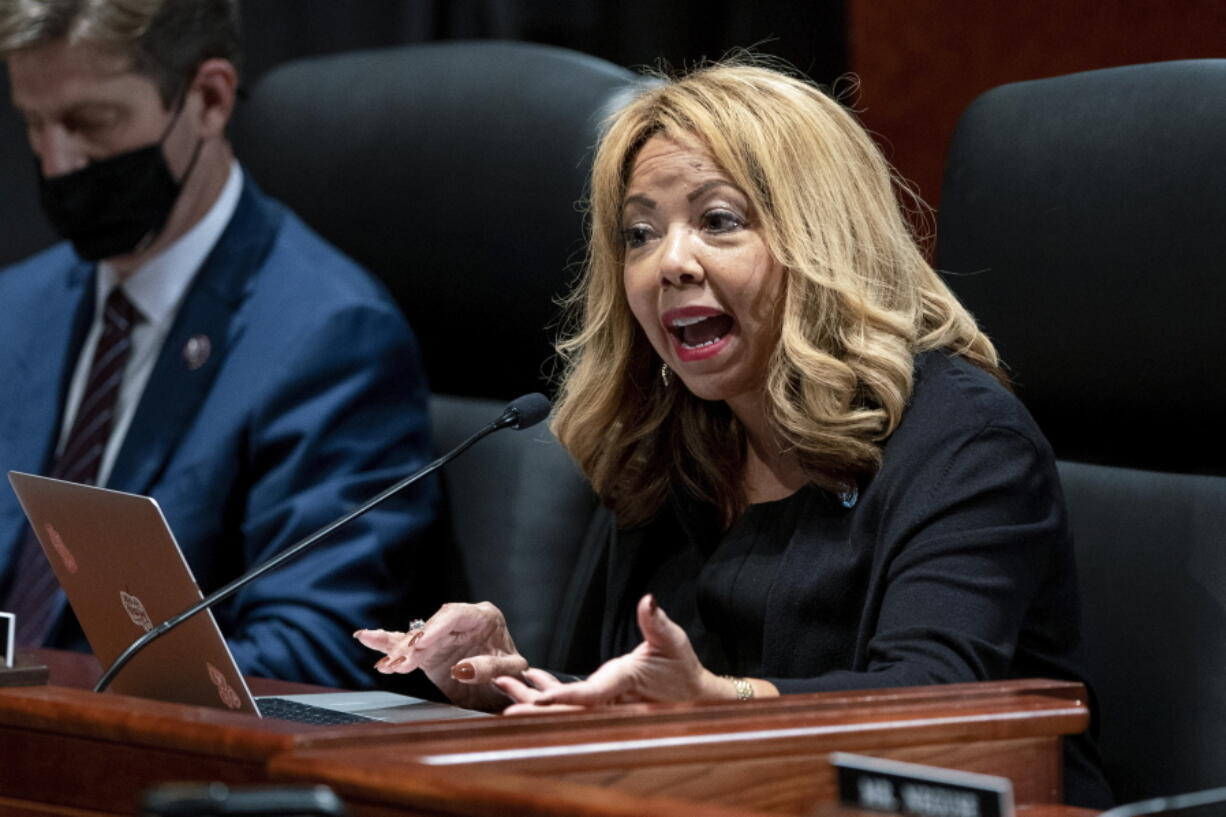 FILE - Rep. Lucy McBath, D-Ga., speaks during a hearing on Oct. 21, 2021, on Capitol Hill in Washington. One casualty of this year's congressional redistricting process across the country is the swing seat in a House district. Political lines are redrawn every 10 years to reflect population changes.