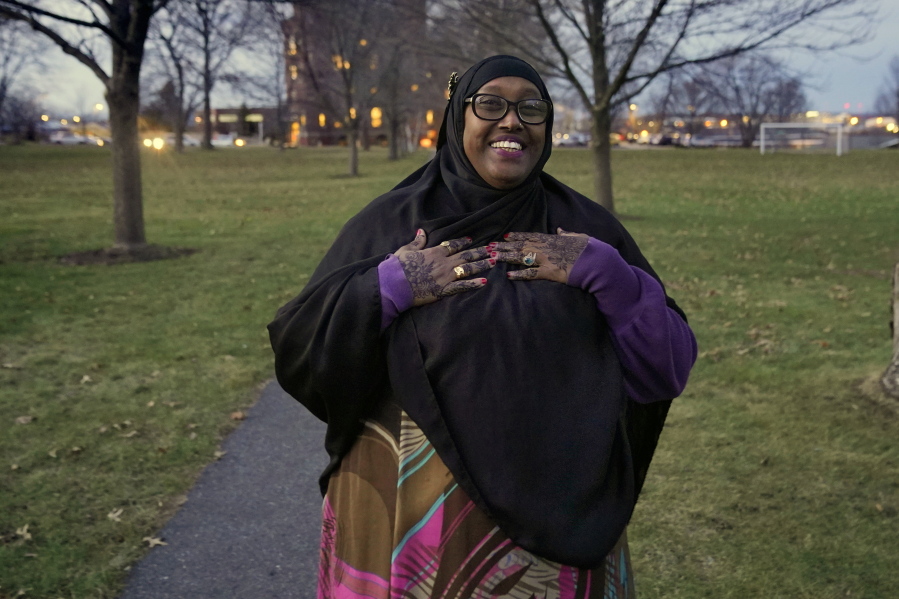 Deqa Dhalac poses near her home Tuesday, Dec. 7, 2021, in South Portland, Maine. On Monday Dhalac, who fled Mogadishu 31 years ago, became the first Somali-American mayor in the United States. (AP Photo/Robert F.