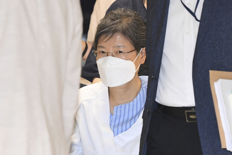 Former South Korean President Park Geun-hye arrives at a hospital in Seoul, South Korea, on July 20, 2021. South Korea on Friday, Dec. 24, 2021 says it will grant a special pardon to Park, who is serving a lengthy prison term for a series of corruption charges.