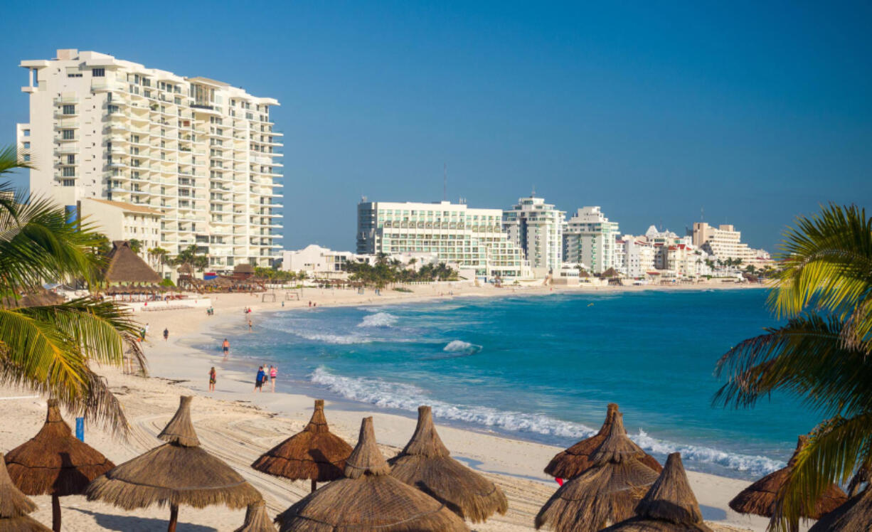 Resort hotels line the beach in Cancun, Mexico. Young tourists were picking Mexico and the Caribbean as their destinations of choice in 2022.