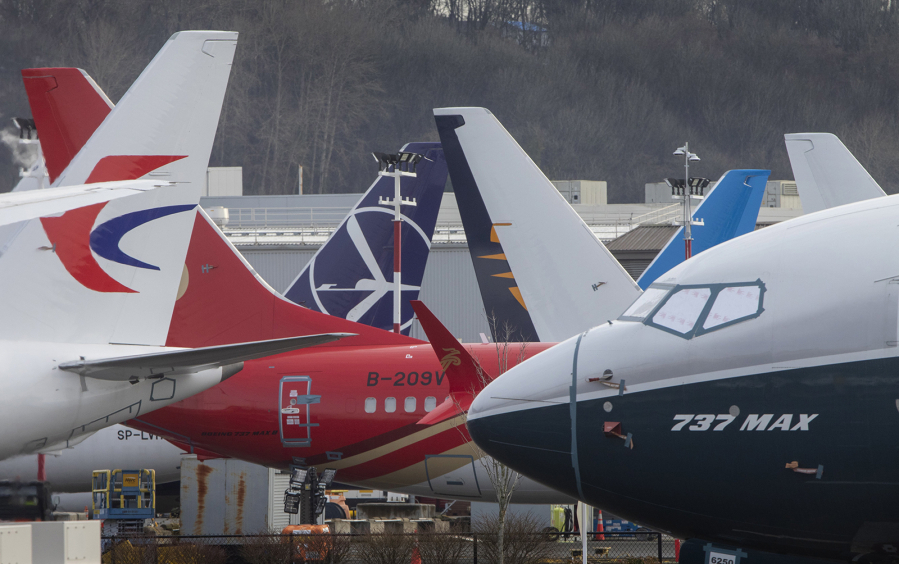 Boeing 737 Max planes are grounded on the west side of Marginal Way, across from Boeing Field in Seattle, Washington, on Friday, Dec. 17, 2021. (Ellen M.