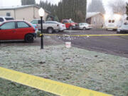 Police tape blocks off the area where Vancouver police officers fatally shot a man they say was armed with a knife Jan. 9. The shooting was at the Sky Ridge Estates mobile home park in Vancouver's North Image neighborhood.