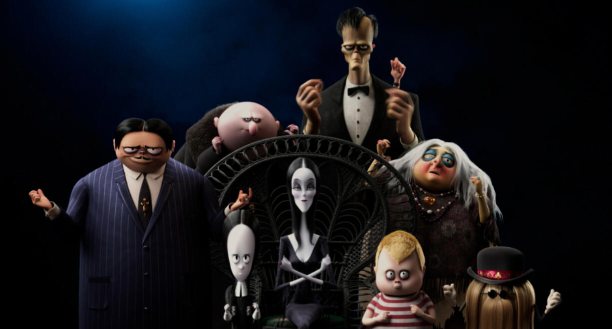 From left, Oscar Isaac as the voice of Gomez Addams, Chloe Grace Moretz as the voice of Wednesday Addams, Nick Kroll as the voice of Uncle Fester, Charlize Theron as the voice of Morticia Addams, Conrad Vernon as the voice of Lurch, Javon Walton as the voice of Pugsley Addams, Bette Midler as the voice of Grandma, and Snoop Dogg as the voice of It in "The Addams Family 2." (Metro-Goldwyn-Mayer Pictures/TNS)