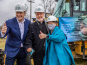 Ford CEO Jim Farley poses for a picture with Pope Francis Center executive director The Rev. Tim McCabe and Julia Burke Foundation board member Robbie Murphy after the groundbreaking ceremony Dec. 3 for Pope Francis Center's New Bridge Housing Campus to end chronic homelessness in Detroit . (Kimberly P.