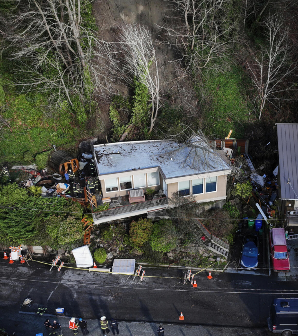 A home slid 15 to 20 feet off its foundation on Jan. 7 in Seattle's Magnolia neighborhood, killing one dog and trapping another for several days.