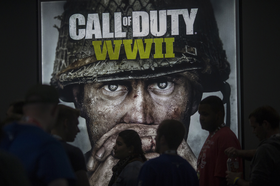 People wait in line to see a demonstration of "Call of Duty WWII" at the Activision exhibit on opening day of the Electronic Entertainment Expo, June 13, 2017, at the Los Angeles Convention Center in Los Angeles.