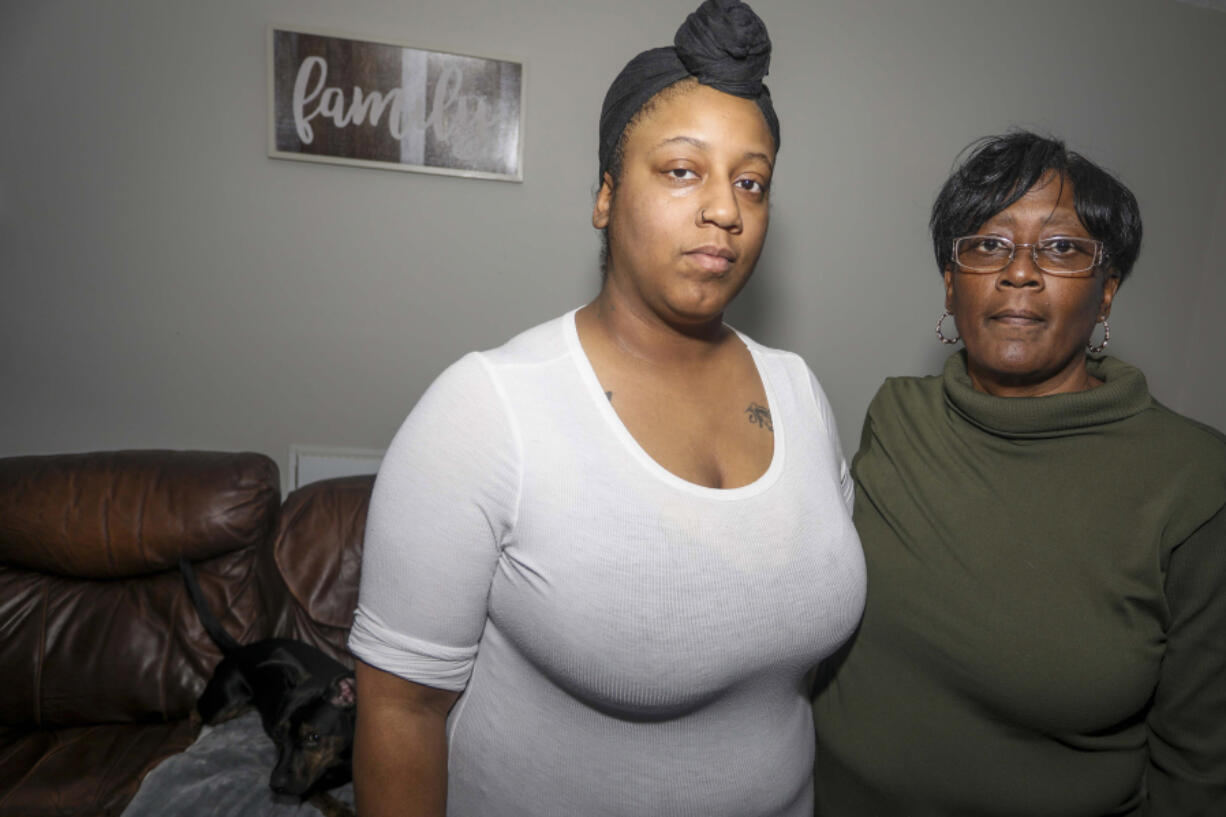 Catherine Owens, 30, and her mother Vanette Owens, 58, who have been living in an Airbnb in recent weeks with financial support from their church, in the living room of a Tampa, Florida, apartment on Jan. 13, 2022. "When you're begging for help, 'please, they're going to evict me,' there???s nobody there," Catherine said.