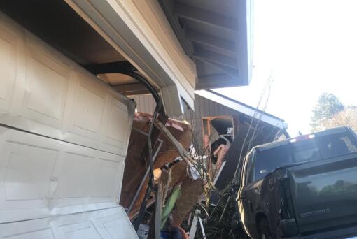 A green pickup truck crashed into a house and parked car in the 14100 block of Southeast McGillivray Boulevard after driving erratically through the east Vancouver neighborhood Monday morning. The driver of the pickup will be booked into the Clark County Jail on suspicion of DUI and multiple counts of hit and run, according to the Vancouver Police Department.