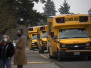 COVID-19 cases continue to rise among students and teachers in districts around Clark County.