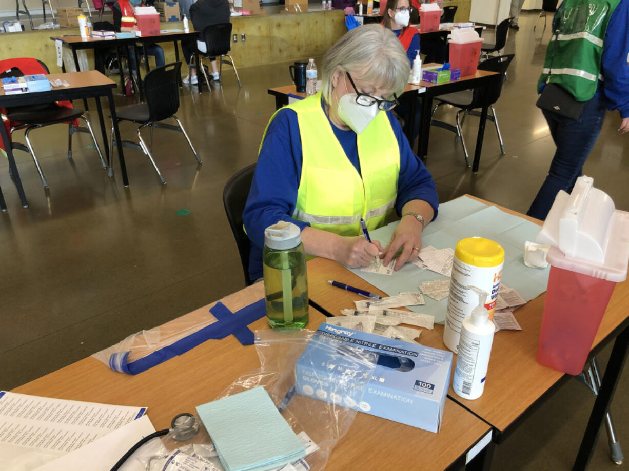 Clark County Public Health has enlisted the help of local volunteers to aid the county's COVID-19 vaccination efforts.