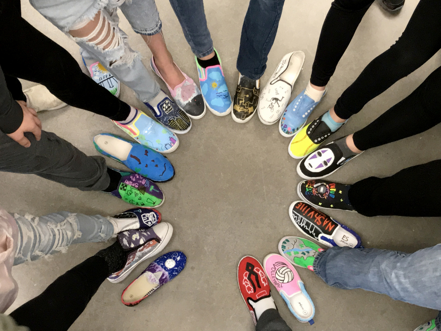 WASHOUGAL: Local students illustrate their ideas for their futures through the Roots and Wings art project. One shoe represents their foundation and the other their goals.
