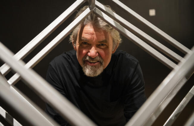 Artist Bill Leigh salvages garbage to create art, including this piece, "Rotating Cubes," on display at Art at the Cave gallery in Vancouver. The piece is made from reclaimed metal railing.