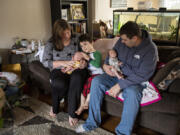 Jessica Jackson used to work in Oregon, but now can work at home in Vancouver, using the income tax savings to help pay for day care for her son, Colin, 4. She and her husband, David, just welcomed twins Landon and Levi.