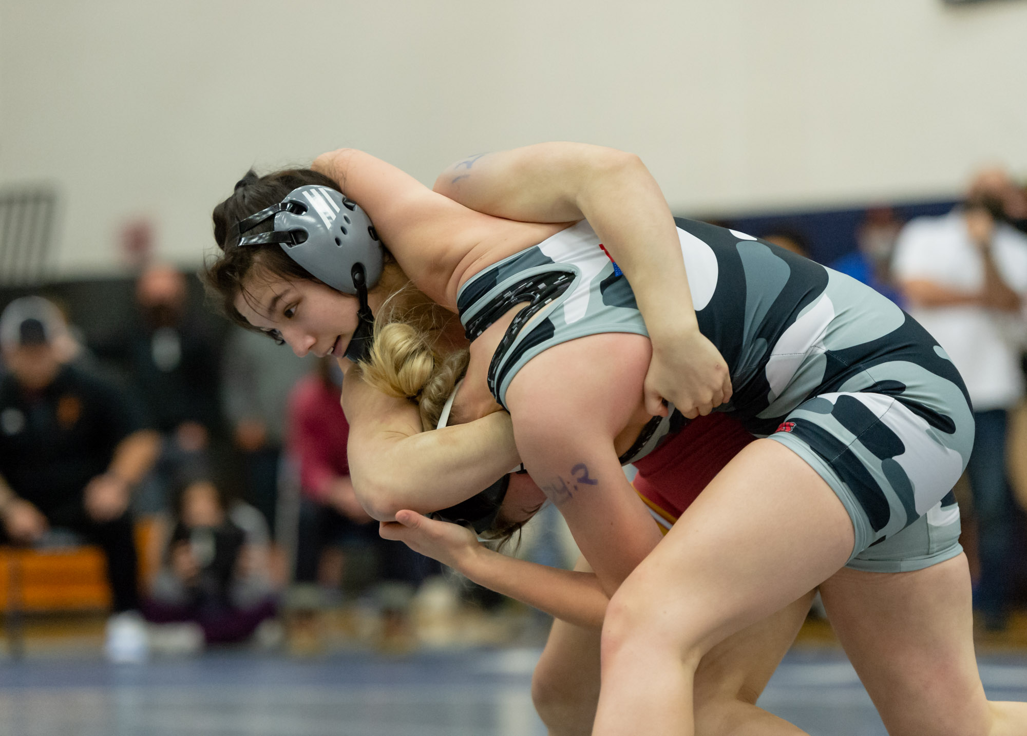 Prairie's Kennedy Wilcox throws Union's Niah Cassidy in the 125-pound finals at the Norm Friehauf Clark County Championships on Saturday, Jan. 15, 2022, at Skyview High School.