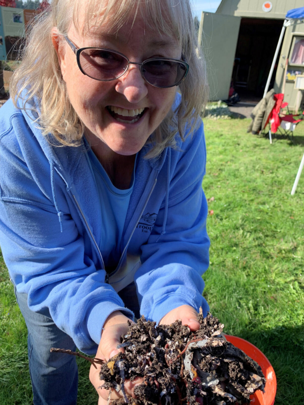 Top left: Sue Lampe is all smiles about vermiculture (worm-bin composting) during a Master Composter Recycler session in 2021.