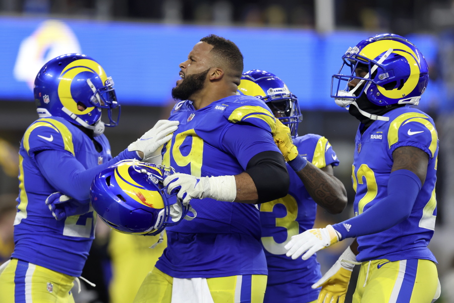 Los Angeles Rams defensive end Aaron Donald, middle, celebrates with teammates during the second half of the NFC Championship NFL football game against the San Francisco 49ers Sunday, Jan. 30, 2022, in Inglewood, Calif.