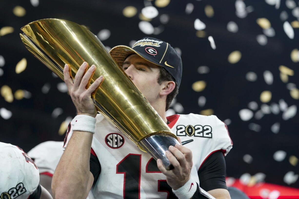 Georgia's Stetson Bennett celebrates after a 33-18 win in the College Football Playoff championship game against Alabama Tuesday in Indianapolis.