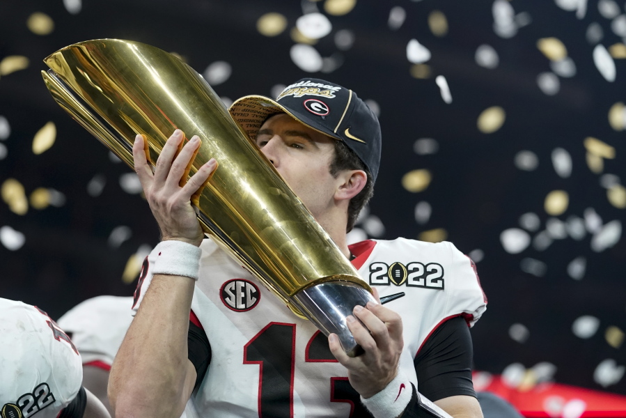 Georgia's Stetson Bennett celebrates after a 33-18 win in the College Football Playoff championship game against Alabama Tuesday in Indianapolis.