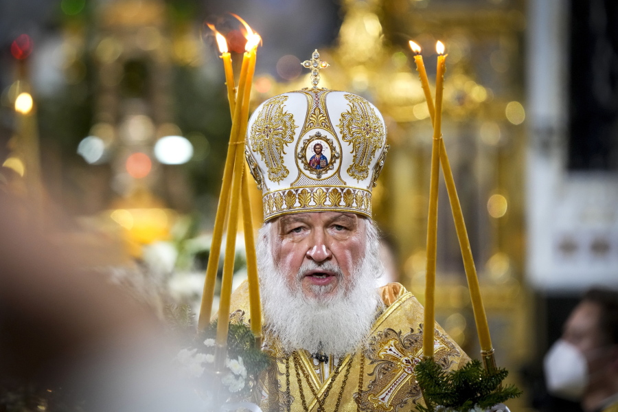 Russian Orthodox Patriarch Kirill delivers the Christmas Liturgy in the Christ the Saviour Cathedral in Moscow, Russia, Thursday, Jan. 6, 2022. Parishioners wearing face masks to protect against coronavirus, observed social distancing guidelines as they attended the liturgy Orthodox Christians celebrate Christmas on Jan. 7, in accordance with the Julian calendar.