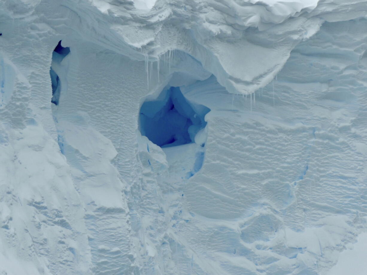 This 2019 photo provided by the British Antarctic Survey shows a hole in the Thwaites glacier in Antarctica. Starting Thursday, Jan. 6, 2021, a team of scientists are sailing to the massive but melting Thwaites glacier, "the place in the world that's the hardest to get to," so they can better figure out how much and how fast seas will rise because of global warming eating away at Antarctica's ice.