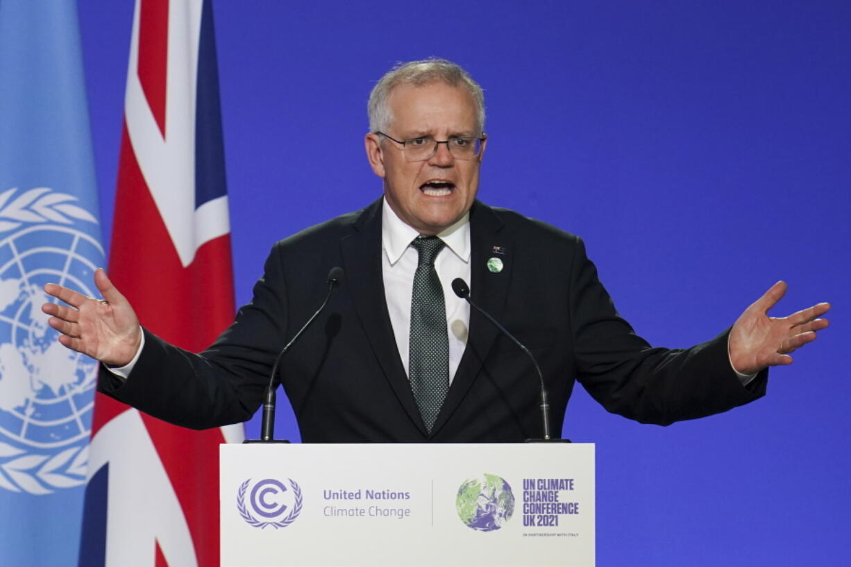 FILE - Australia's Prime Minister Scott Morrison delivers an address, during the COP26 Summit, at the SECC in Glasgow, Scotland, Monday, Nov. 1, 2021. A newspaper has reported Morrison's account on Chinese-owned social media platform WeChat has been taken over and renamed. Sydney's The Daily Telegraph newspaper reported Morrison's 76,000 WeChat followers were notified his page has been renamed "Australian Chinese new life" earlier this month. The change was made without the government's knowledge.