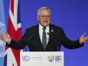 FILE - Australia's Prime Minister Scott Morrison delivers an address, during the COP26 Summit, at the SECC in Glasgow, Scotland, Monday, Nov. 1, 2021. A newspaper has reported Morrison's account on Chinese-owned social media platform WeChat has been taken over and renamed. Sydney's The Daily Telegraph newspaper reported Morrison's 76,000 WeChat followers were notified his page has been renamed "Australian Chinese new life" earlier this month. The change was made without the government's knowledge.