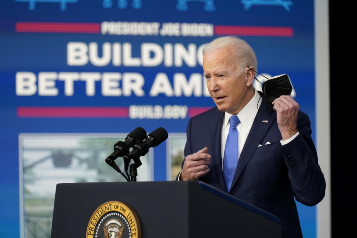 President Joe Biden begins to speak Friday about the Bipartisan Infrastructure Law at the South Court Auditorium in the Eisenhower Executive Office Building on the White House Campus in Washington.