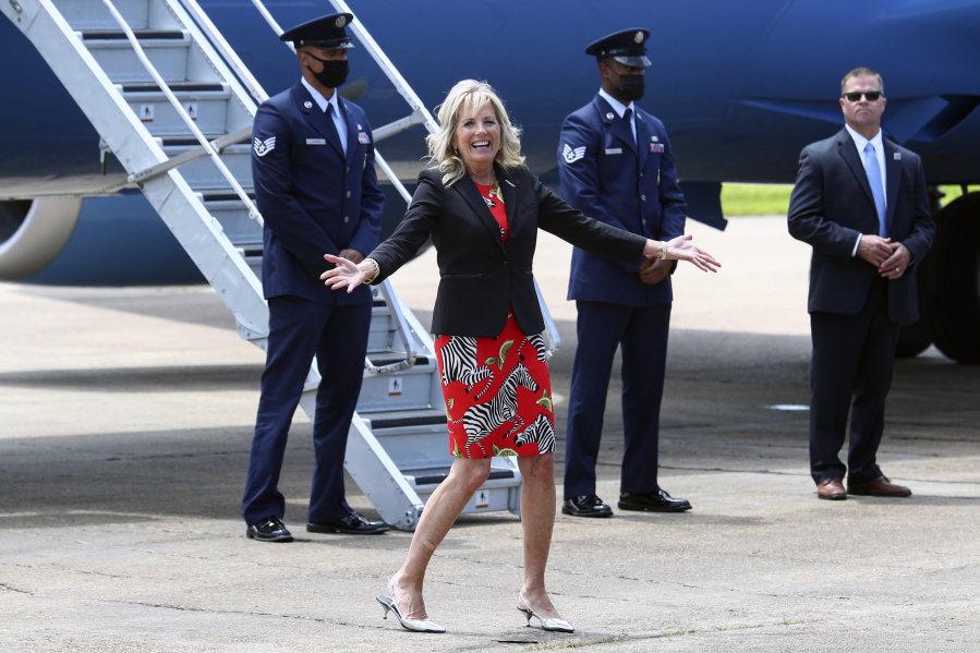 FILE - First lady Jill Biden reacts to a question from a reporter at Jackson-Medgar Wiley Evers International Airport, in Pearl, Miss., on June 22, 2021.