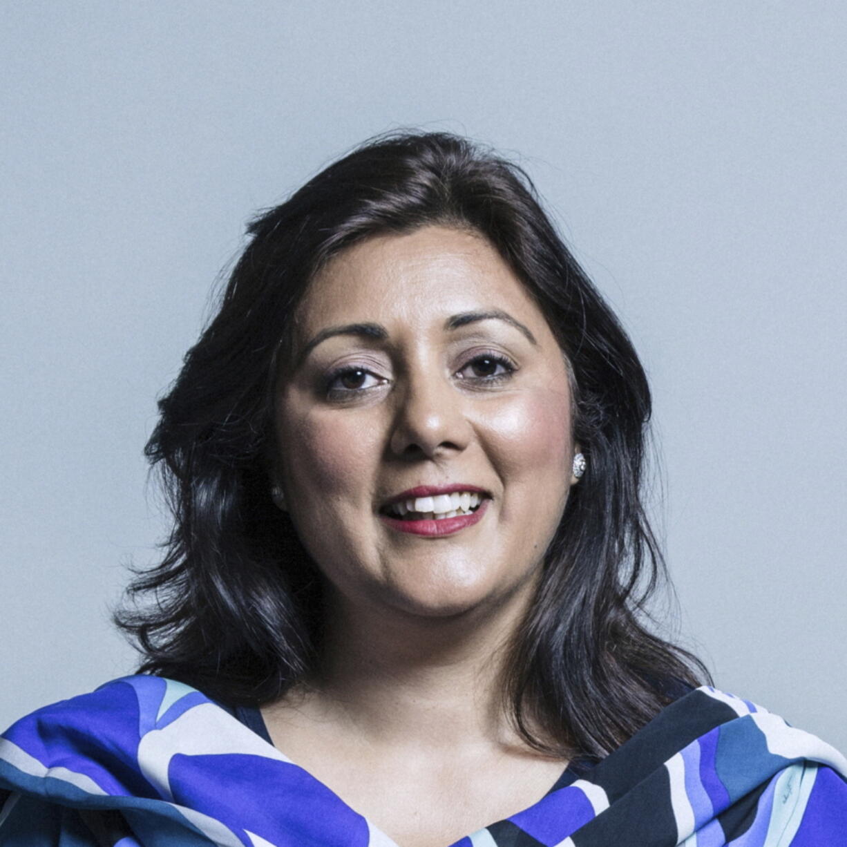 An official file portrait provided by Britain's Parliament of Conservative lawmaker Nusrat Ghani. Ghani, a former minister in Britain's Conservative government says she was told that her Muslim faith was a reason she was fired. The claim has deepened the rifts roiling Prime Minister Boris Johnson's governing party.