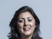 An official file portrait provided by Britain's Parliament of Conservative lawmaker Nusrat Ghani. Ghani, a former minister in Britain's Conservative government says she was told that her Muslim faith was a reason she was fired. The claim has deepened the rifts roiling Prime Minister Boris Johnson's governing party.
