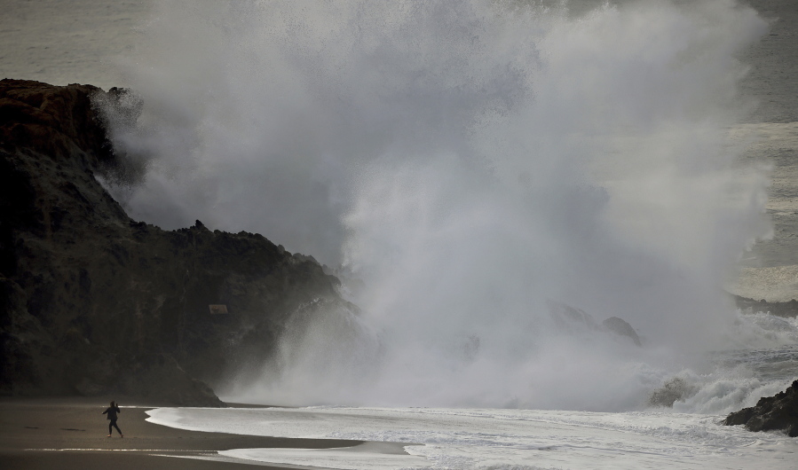 Coupled with a heavy surf and a tsunami advisory for the West Coast, large waves crash ashore Jan. 15 at Wrights Beach, north of Bodega Bay, Calif., following a massive undersea volcanic explosion of the Hunga Tonga Hunga Ha'apai volcano in Tonga.