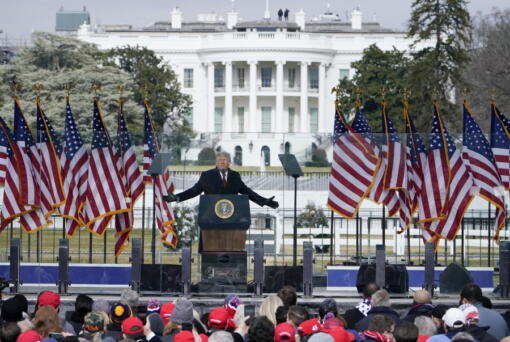 FILE - The White House in the background, President Donald Trump speaks at a rally in Washington, Jan. 6, 2021. The House committee investigating the U.S. Capitol insurrection is asking Ivanka Trump, daughter of former President Donald Trump, to voluntarily cooperate with its investigation.