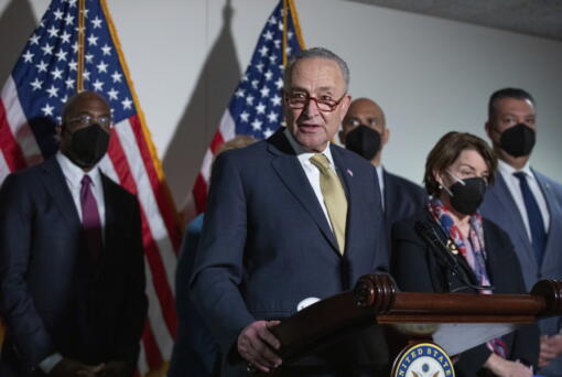 Senate Majority Leader Chuck Schumer, D-N.Y., speaks to reporters alongside, from left, Sen. Raphael Warnock, D-Ga., Sen. Cory Booker, D-N.J., Sen. Amy Klobuchar, D-Minn., and Sen. Alex Padilla, D-Calif., during a press conference regarding the Democratic party's shift to focus on voting rights at the Capitol in Washington, Tuesday, Jan. 18, 2022.
