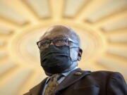 Majority Whip Jim Clyburn, D-S.C., alongside other members of the Congressional Black Caucus, stands in front of the Senate chambers to voice his support of voting rights legislation at the Capitol in Washington, Wednesday, Jan. 19, 2022.