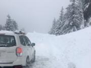 Snow is causing challenges for drivers heading into the Gorge on Highway 14.