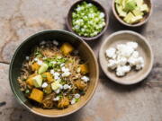 This image released by Milk Street shows a recipe for sopa seca w/butternut squash .